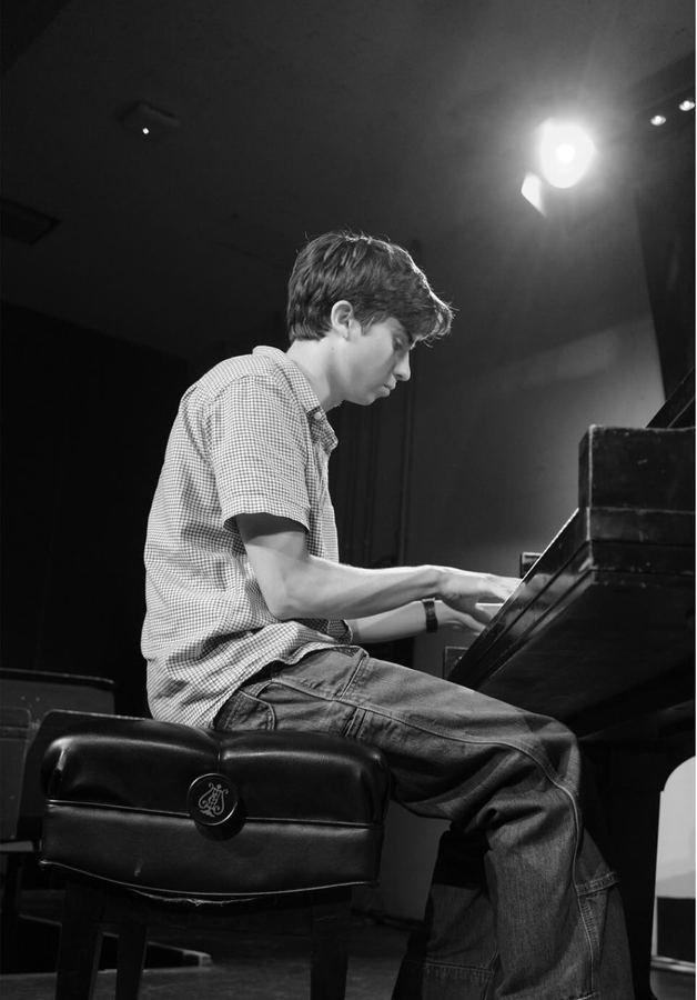 Lyric Anderson at the piano, black and white